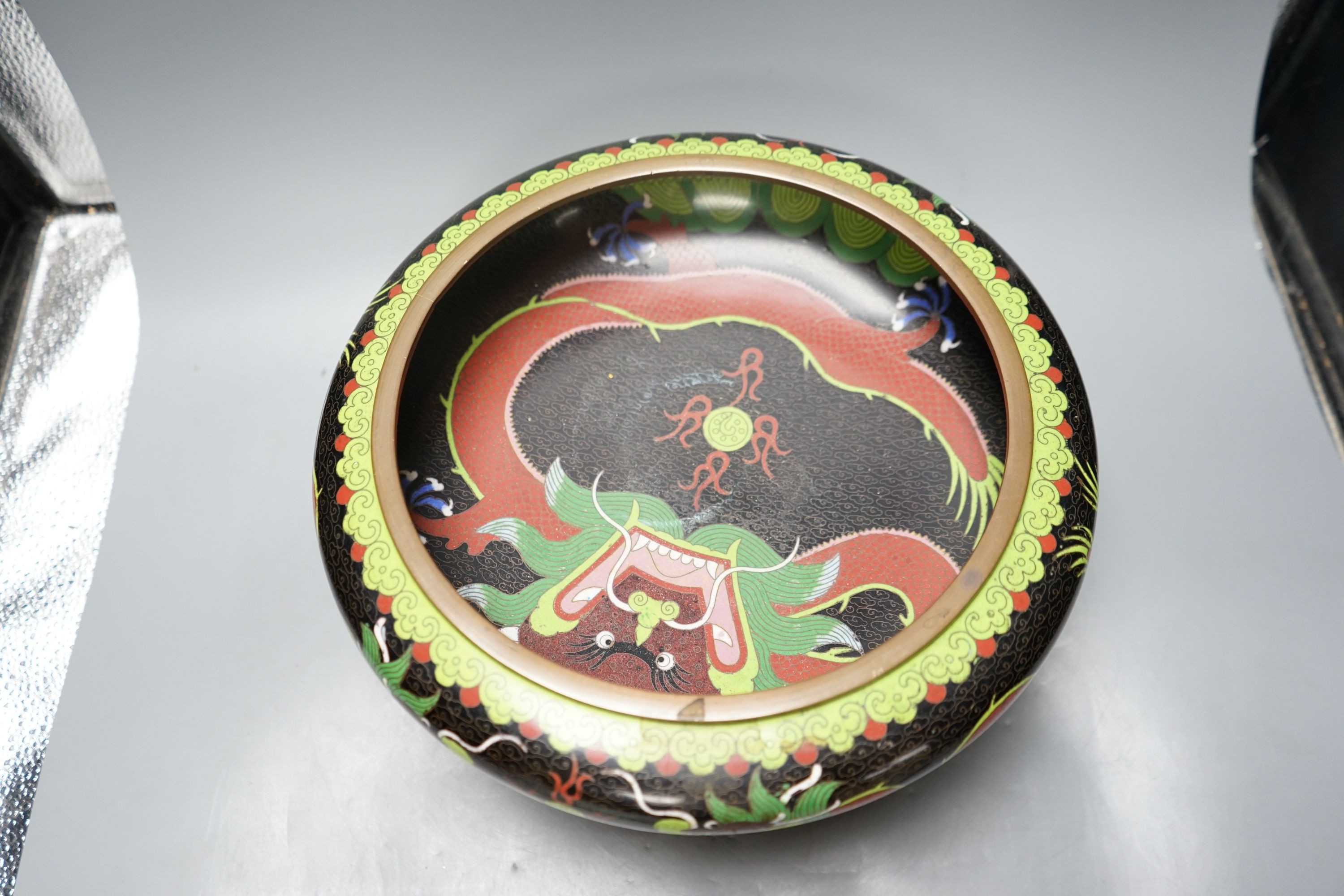 A large early 20th century Chinese cloisonné enamel ‘dragon’ bowl and two Chinese Tongzhi celadon ground famille rose bowls 31cm